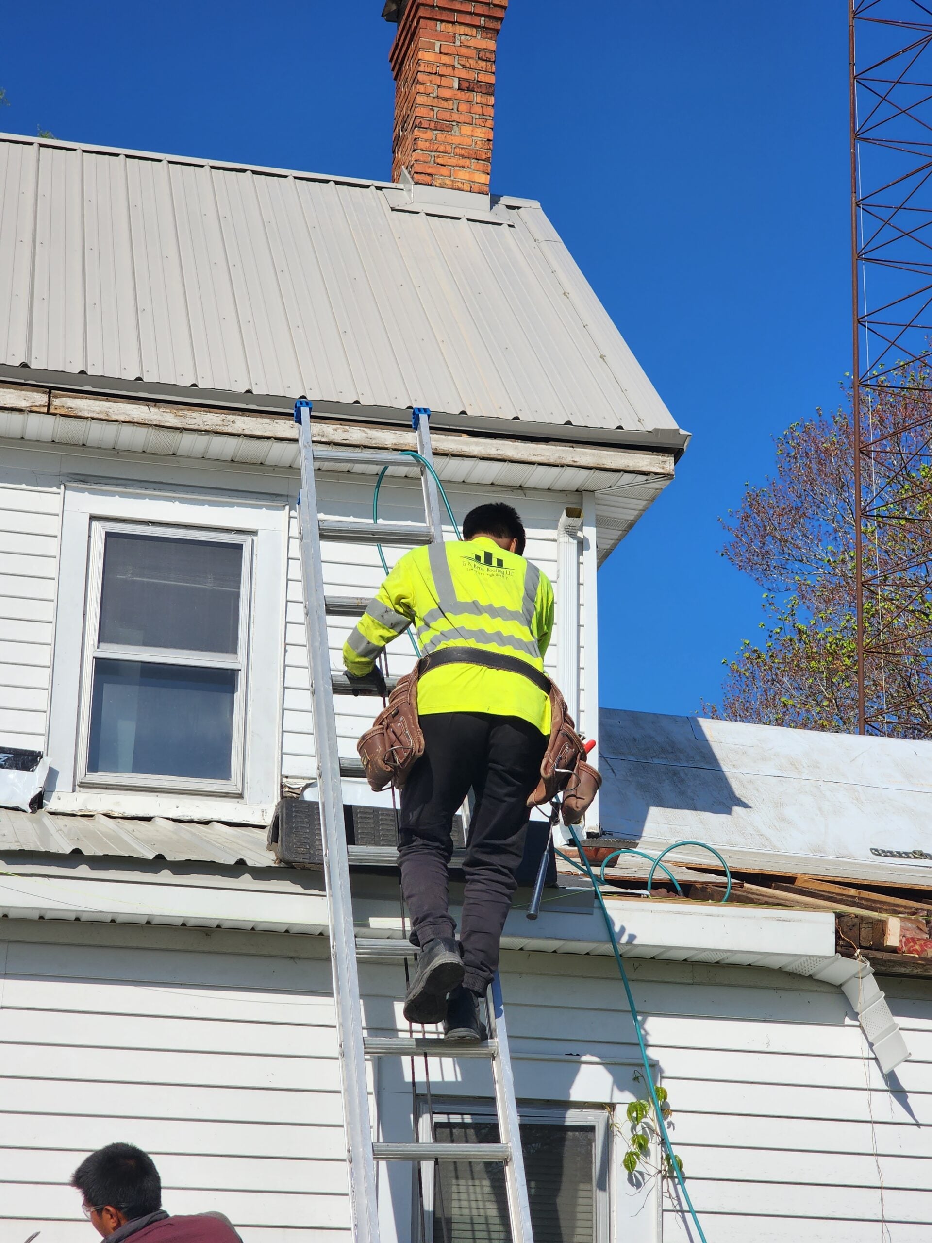 What to Do About an Aging Metal Roof: Maintenance, Repair, and Replacement Decisions 2 | G and Bros Aging metal roof on a Delmarva home showing discoloration and fastener wear but still in usable condition