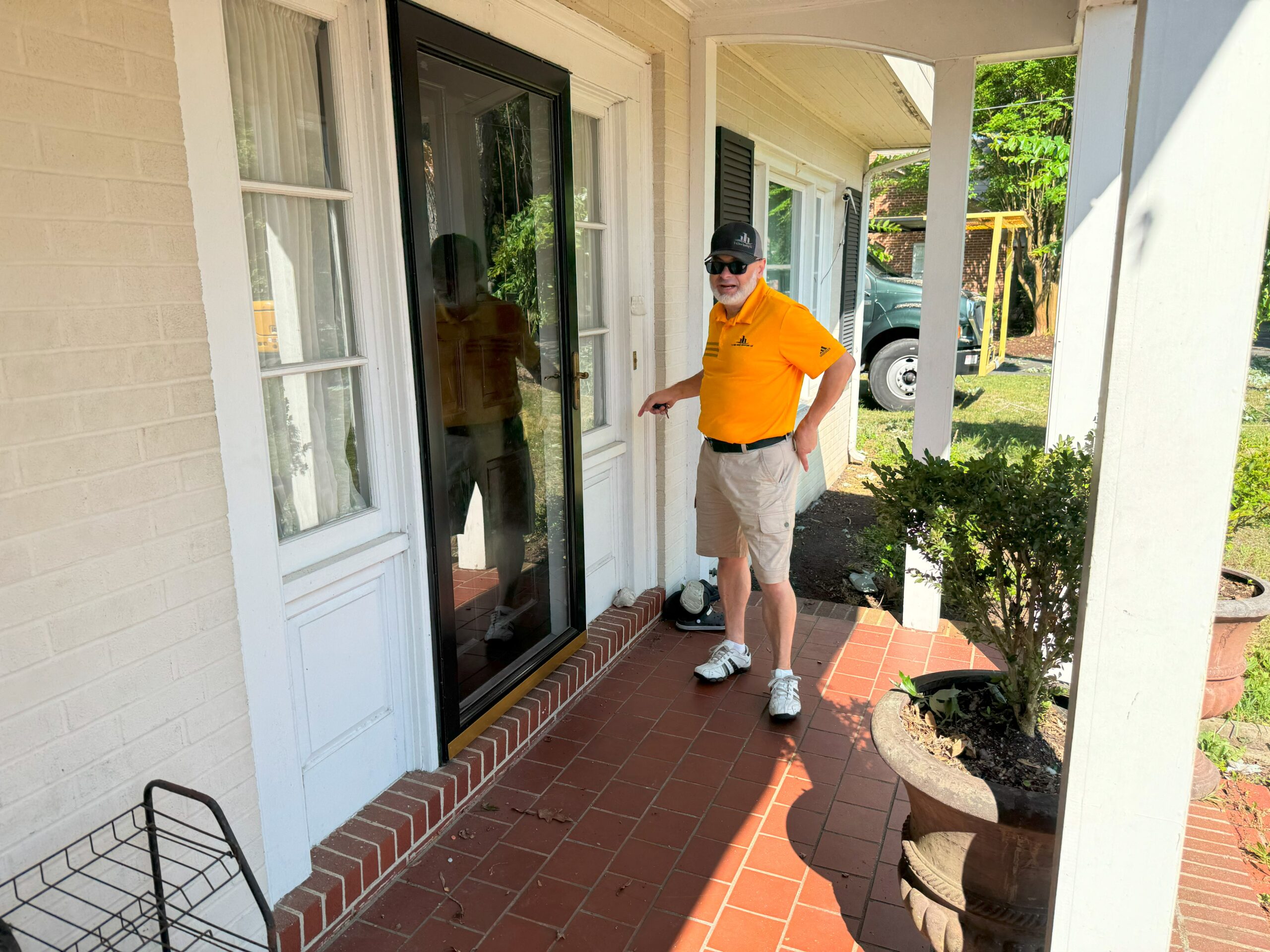 Used - Luis Camacho, G and Bros Roofing sales employee, door knocking to sell a roof. Salisbury MD